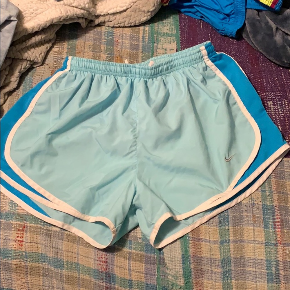 Light blue nike running shorts
